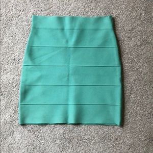 BCBG pencil stretchy skirt. Color: Teal